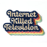 Iron-On Patch of the cursive phrase "Internet Killed Television" on a blue background with a multicolored outline on the bottom and right side - by Charles Trippy