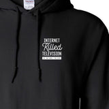 Close-up on the front right side of a black hoodie with the white writing "Internet Killed Television EST MAY MMIX / CTFXC" - by Charles Trippy
