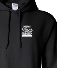 Close-up on the front right side of a black hoodie with the white writing "Internet Killed Television EST MAY MMIX / CTFXC" - by Charles Trippy