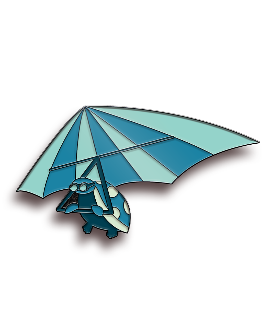 A monochrome blue pin of a cartoon drawing of a turtle flying a hangglider. The turtle has goggles on and a spotted shell. The hangglider has alternating blue stripes - from JoCo Cruise