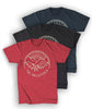 Red, black and navy shirts with a distressed circular logo of a white outline of mountains, a lake, trees, and a sun rising. “The Valleyfolk” is arched at the bottom in white sans serif font - from the Valleyfolk