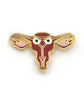 A gold enamel pin in the shape of a uterus with eyes. From Scishow. 