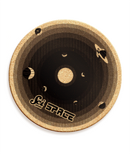 A round cork board with shades of black, showing the different planets. It says "Scishow Space" on the outer edge.