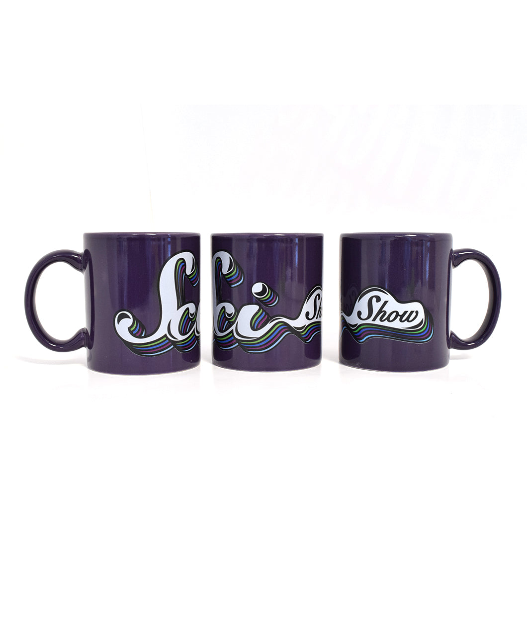 Dark purple mug with “SciShow” logo. “Sci” is in white cursive font with a bubble attached surrounding “Show” in black cursive font. A green, purple, and blue drop shadow is behind logo - from SciShow