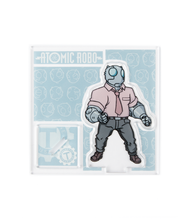 Atomic Robo in standee form on a blue backing that says Atomic Robo. 