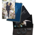 Five different art prints, three showing different crystalized animals, one skeleton drawing of a frog, and a drawing of a bird - from Tyler Thrasher