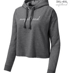 A dark gray crop top hoodie with “unfiltered” in white cursive font across the chest - from Sierra Schultzzie