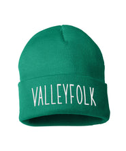 A green beanie with “Valleyfolk” in white sans serif font across the front - from the Valleyfolk